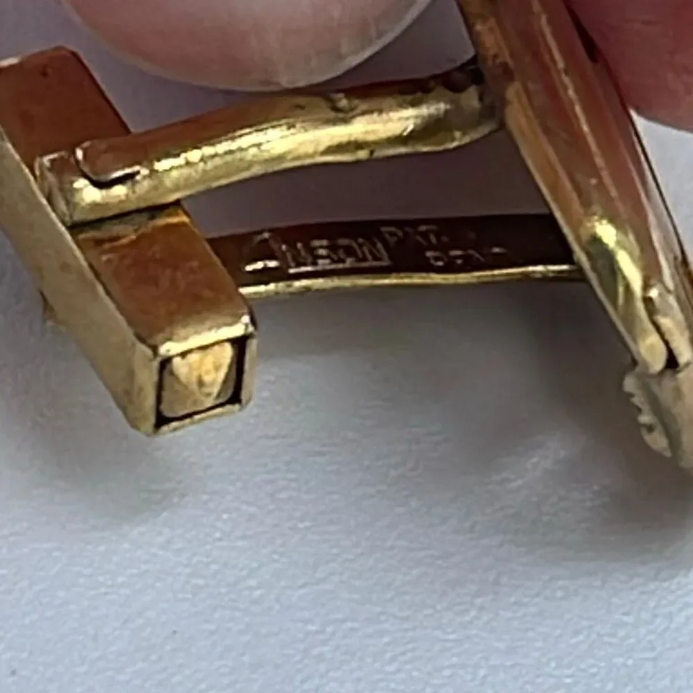 Vintage Anson gold tone shiny matte open design cufflinks.
